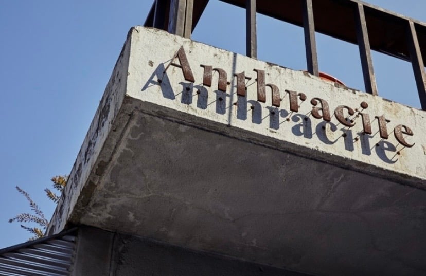 Anthracite Hapjeong factory cafe industrial interior near YG Entertainment Seoul TREASURE fan spot